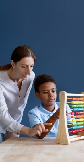 little-boy-having-occupational-therapy-session-with-psychologist